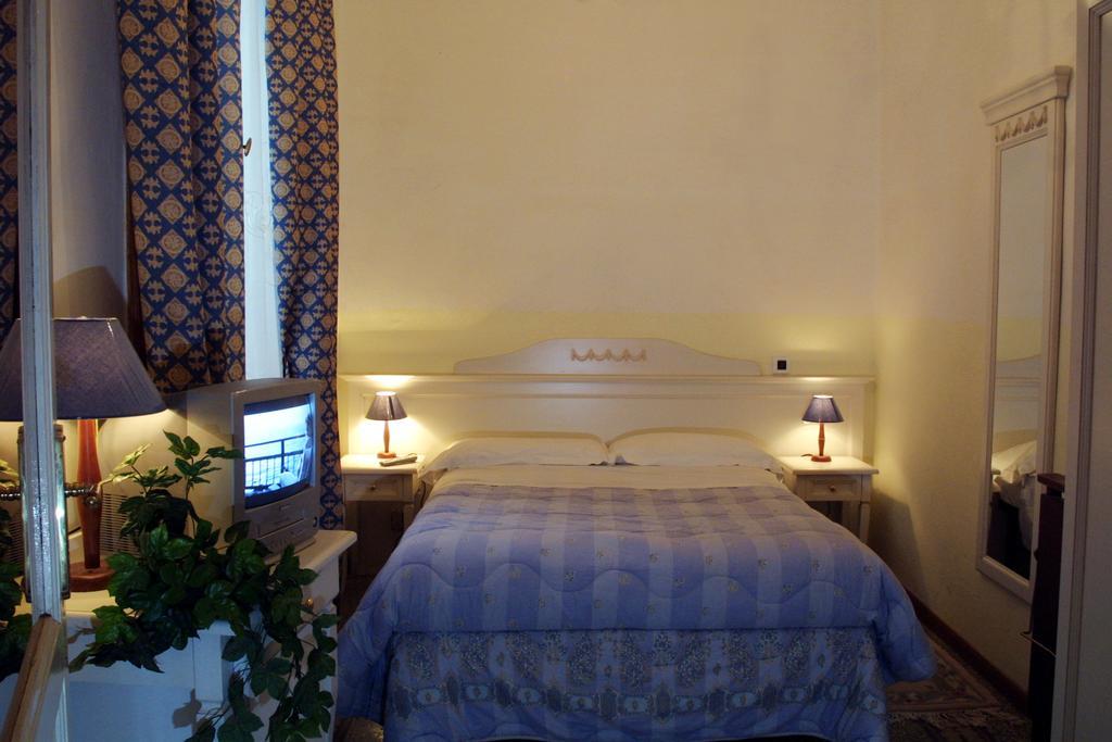 Casa Maya Souvenir Florença Quarto foto